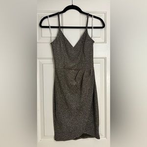 Lulu’s black dress with silver.